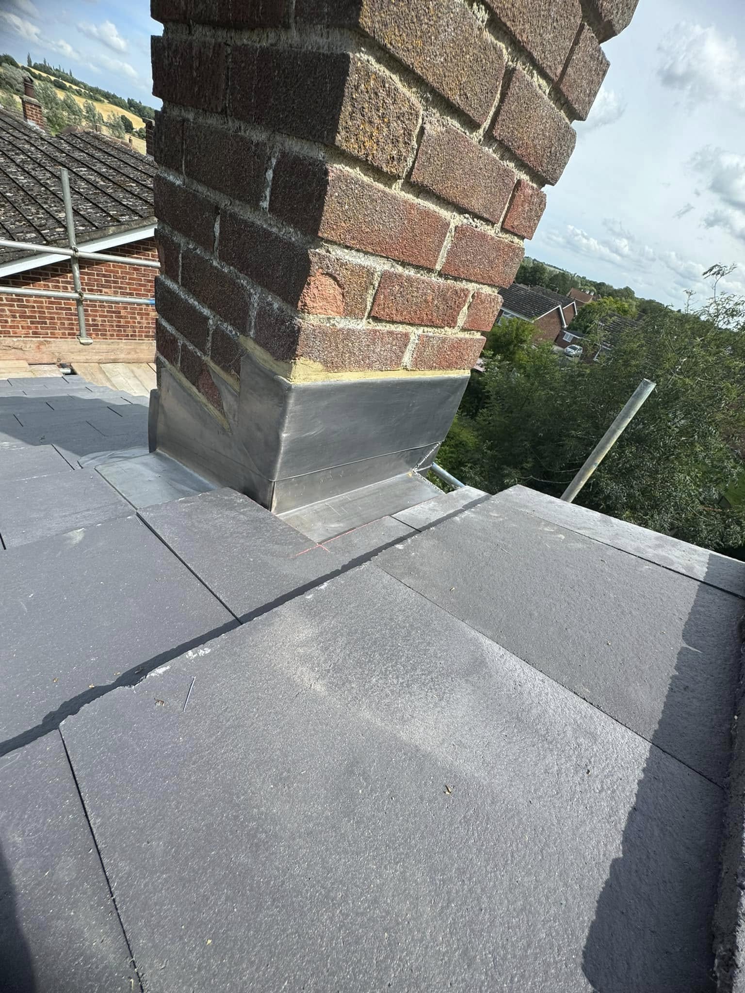 Roof chimney repair and flashing