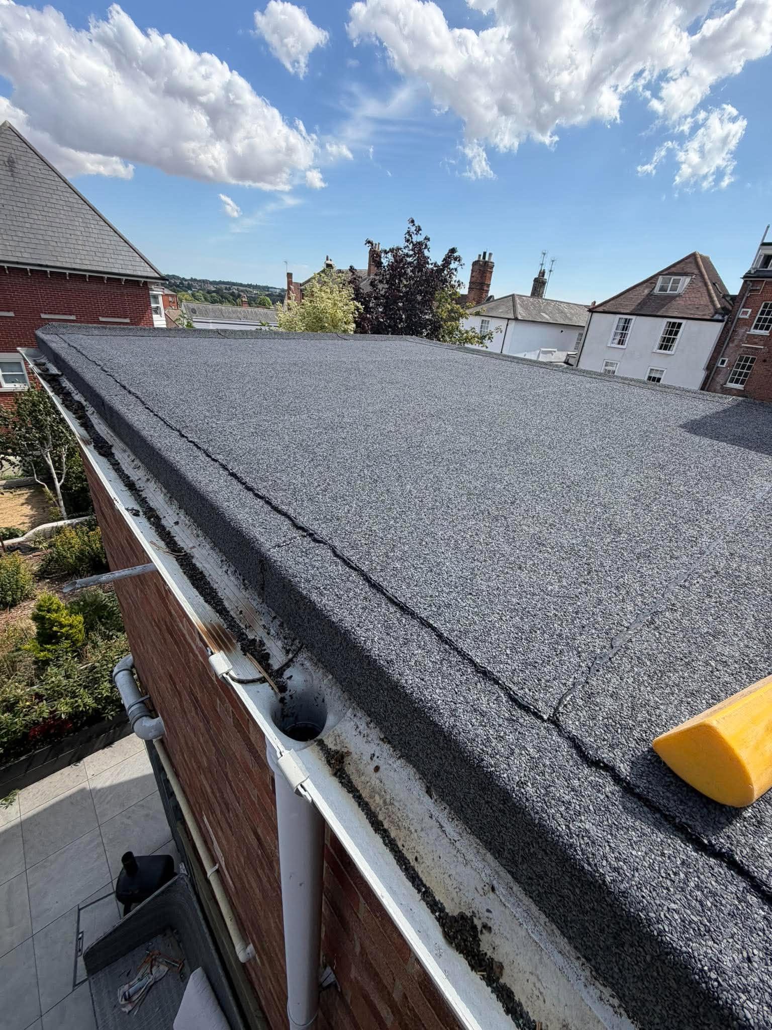 Completed flat roof system